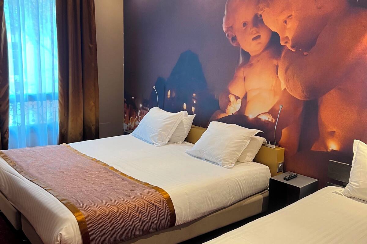 triple room | premium bedding, in-room safe, individually decorated, desk