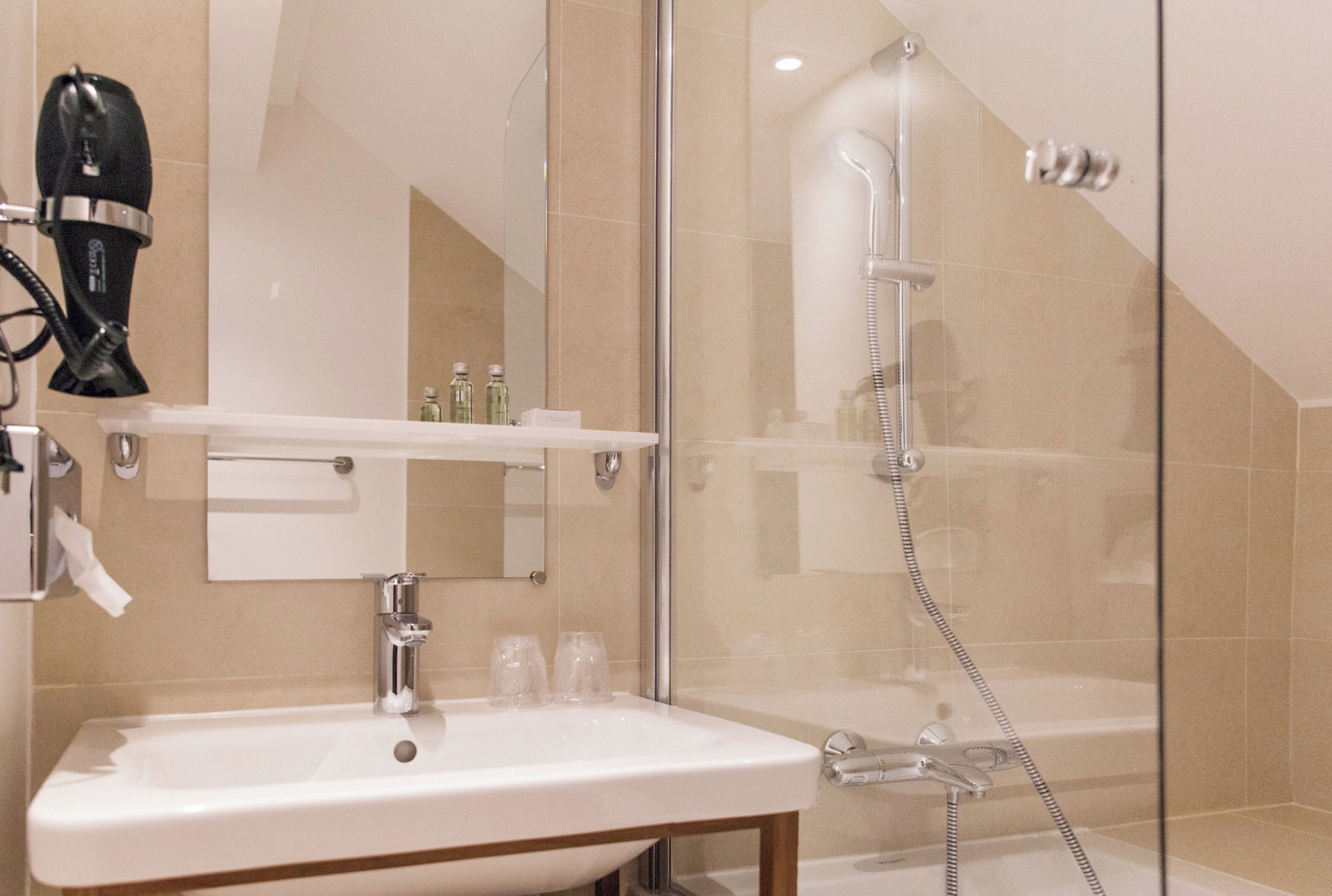 hair dryer, towels, soap, shampoo