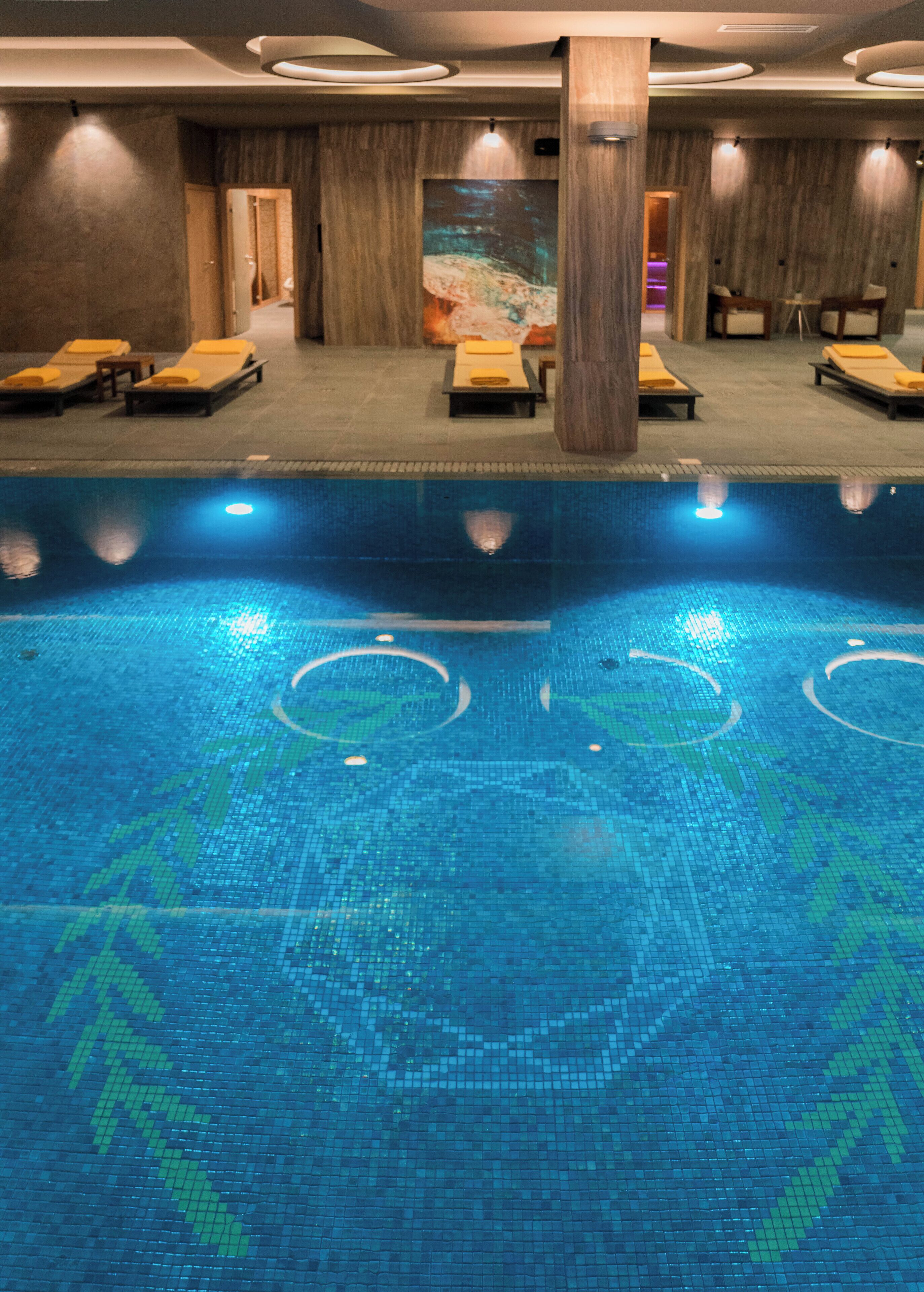 indoor pool, outdoor pool, pool loungers