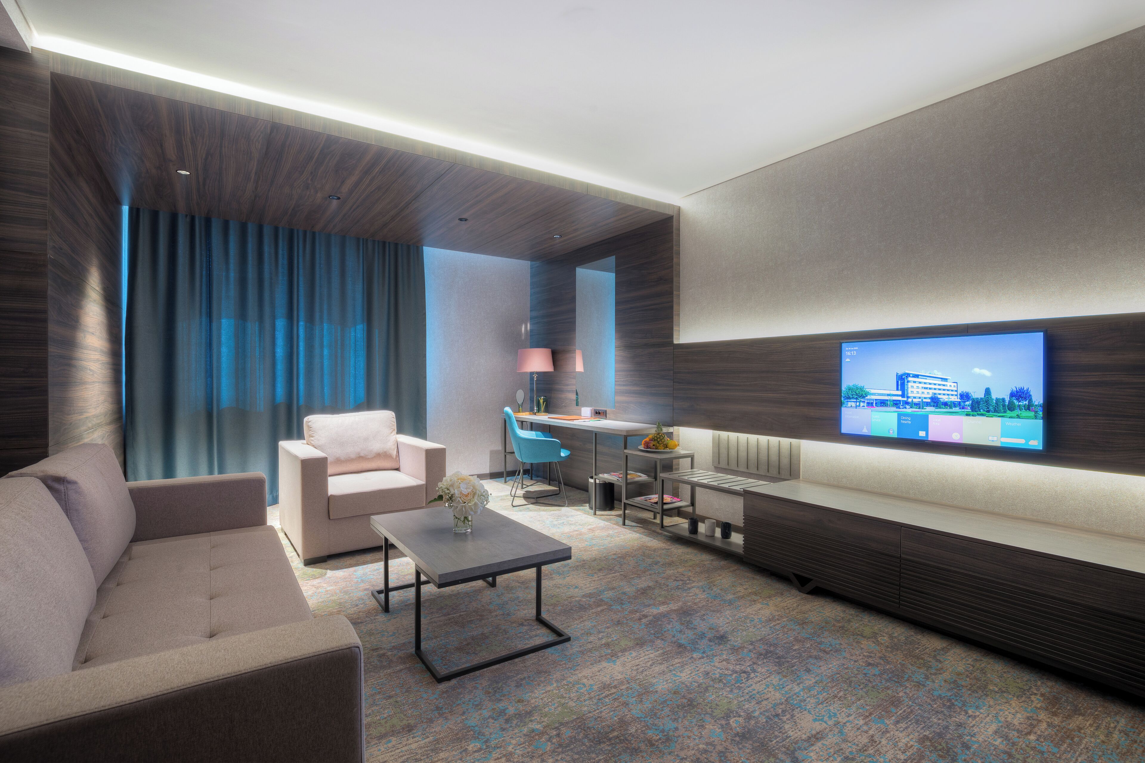 deluxe suite | living area | 32-inch lcd tv with satellite channels, tv