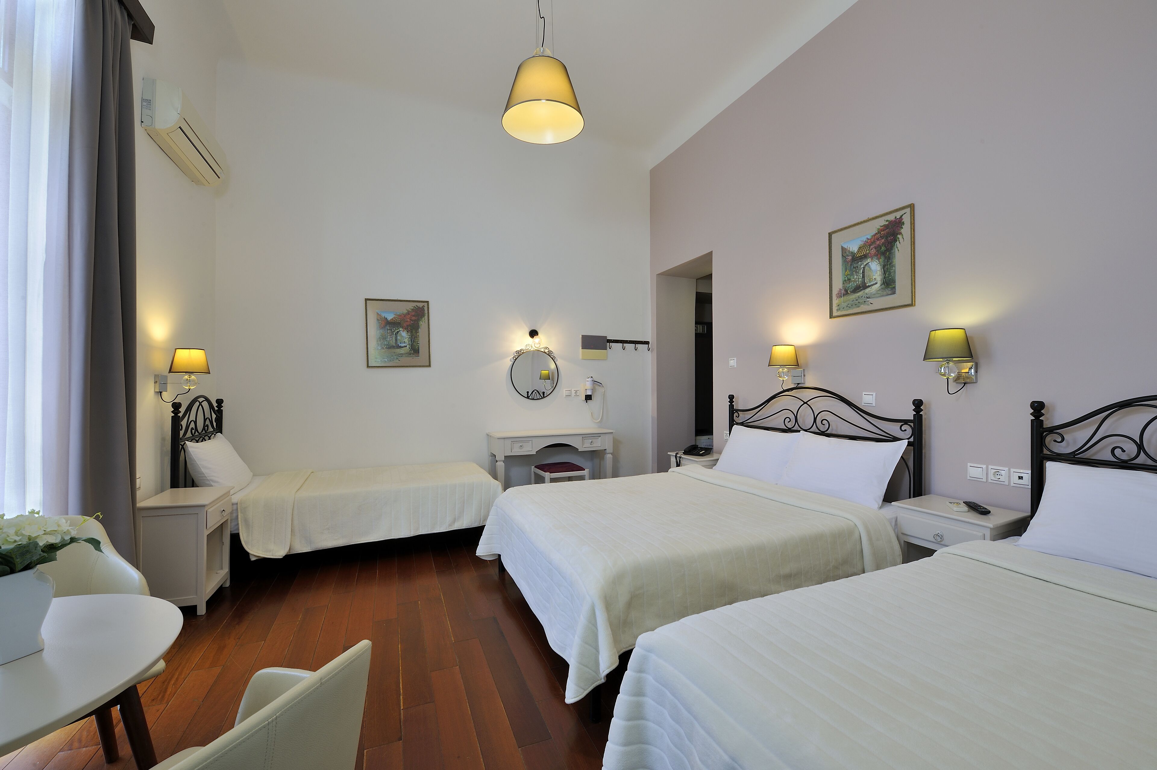 standard quadruple room, balcony | 1 bedroom, down duvets, pillow-top beds, in-room safe