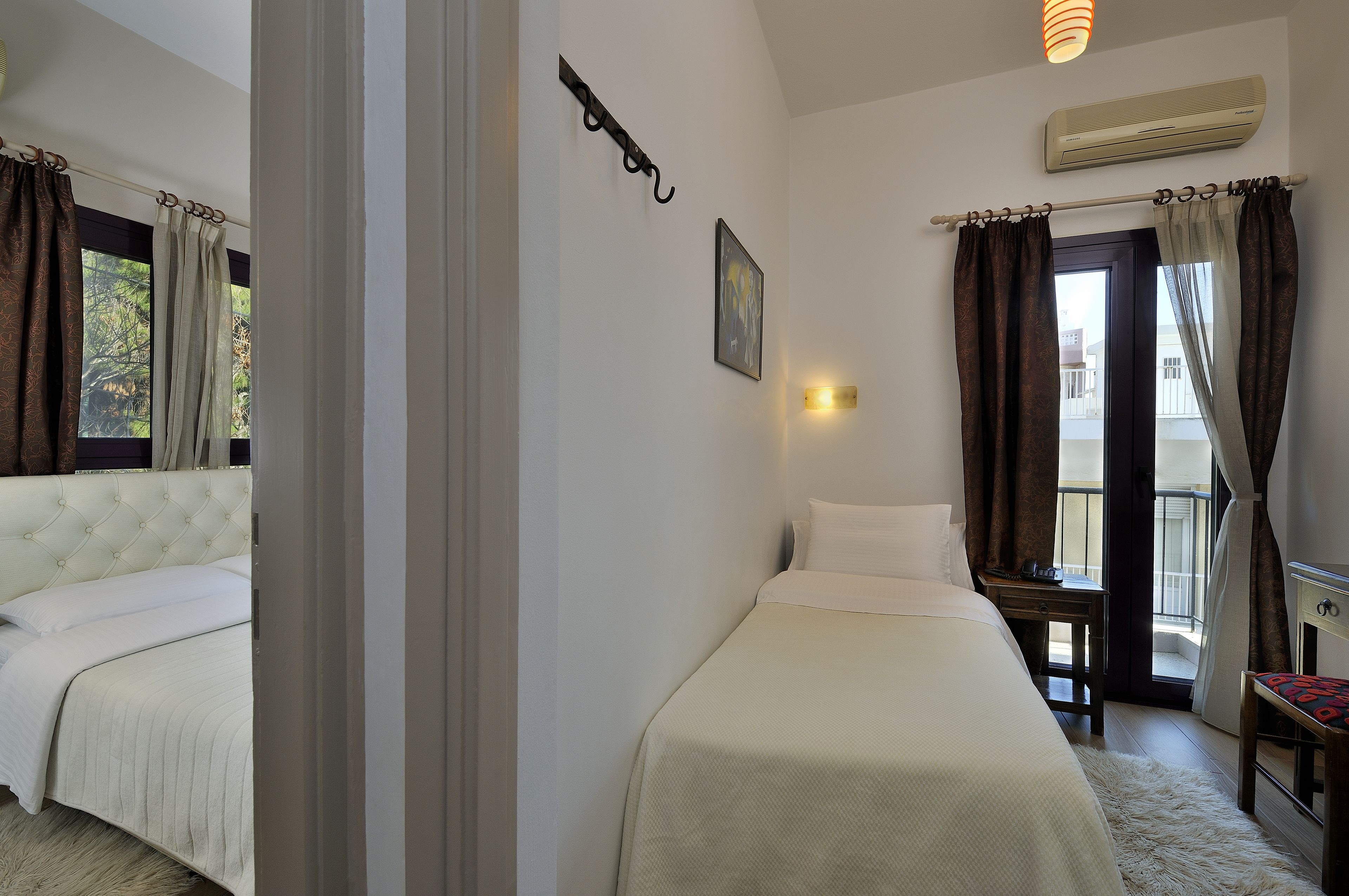 standard triple room | 1 bedroom, down duvets, pillow-top beds, in-room safe