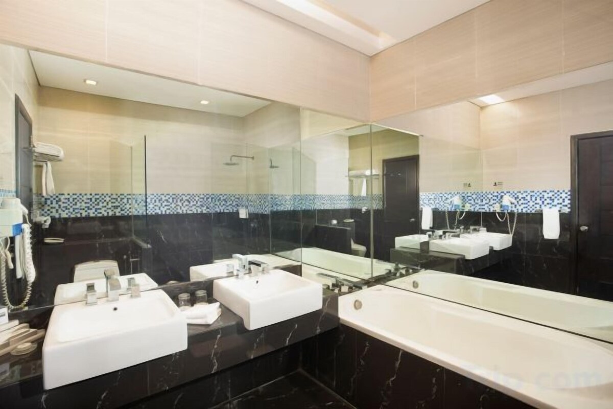 Bathroom | Shower, free toiletries, hair dryer (on request), slippers