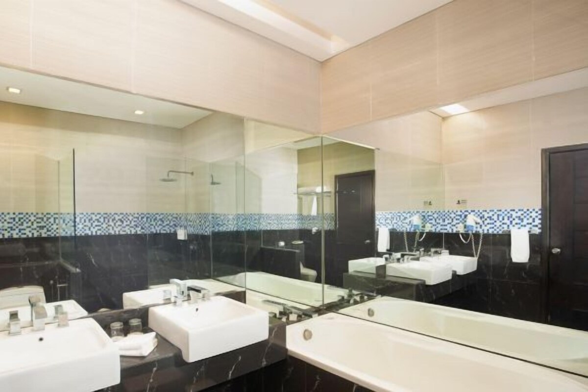 Bathroom | Shower, free toiletries, hair dryer (on request), slippers