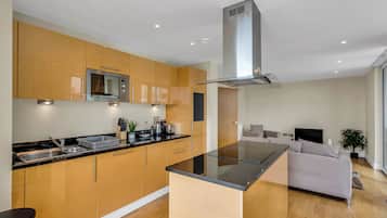 Superior Apartment, 2 Bedrooms | Private kitchen | Fridge, microwave, oven, stovetop