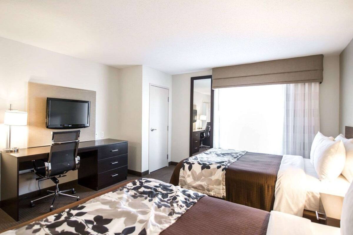 premium bedding, pillow-top beds, desk, blackout curtains