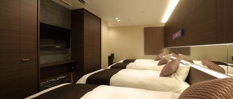 Quadruple Room, Non Smoking | Down comforters, blackout drapes, free WiFi