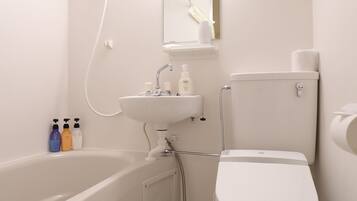 Combined shower/tub, hair dryer, slippers, bidet