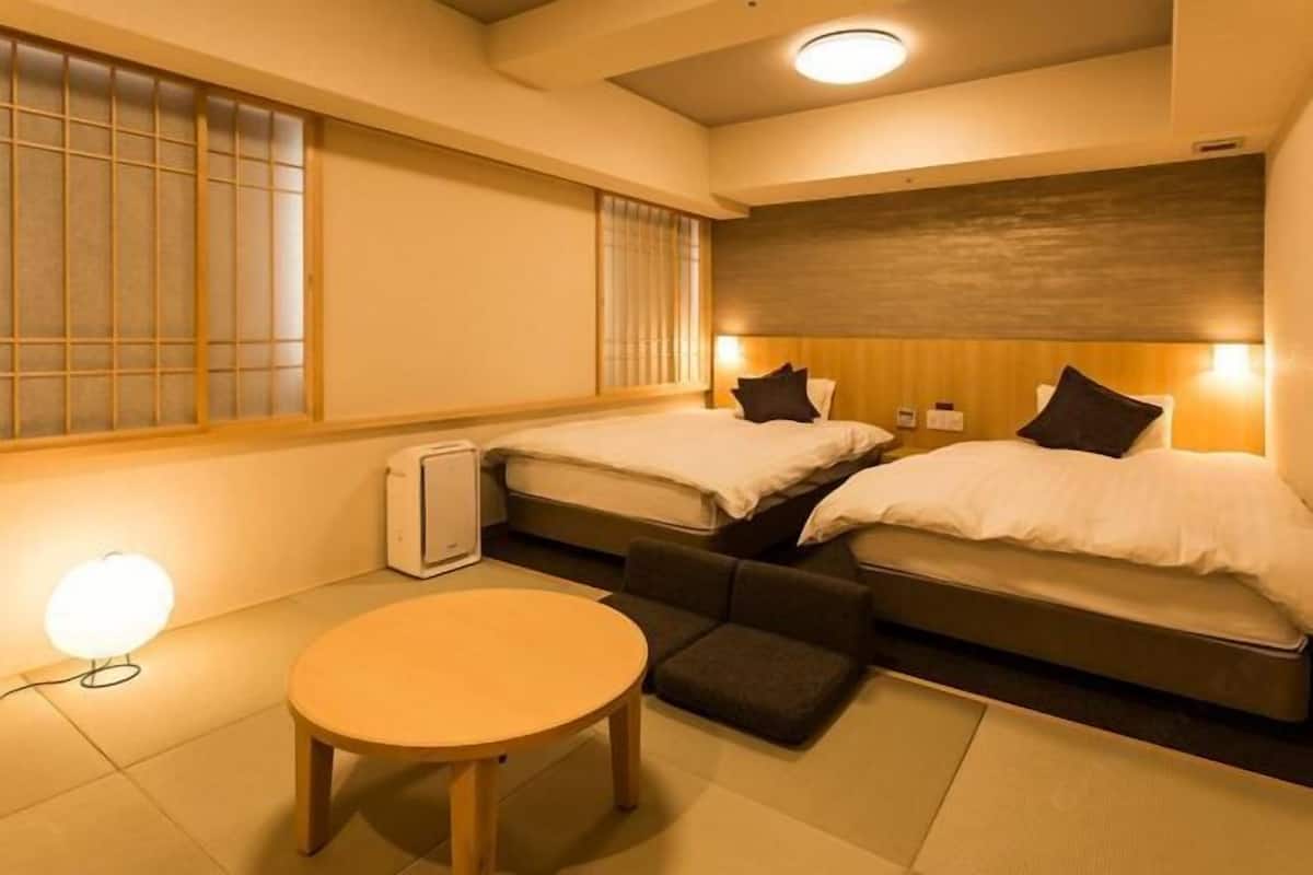 Premium bedding, down duvets, blackout curtains, iron/ironing board