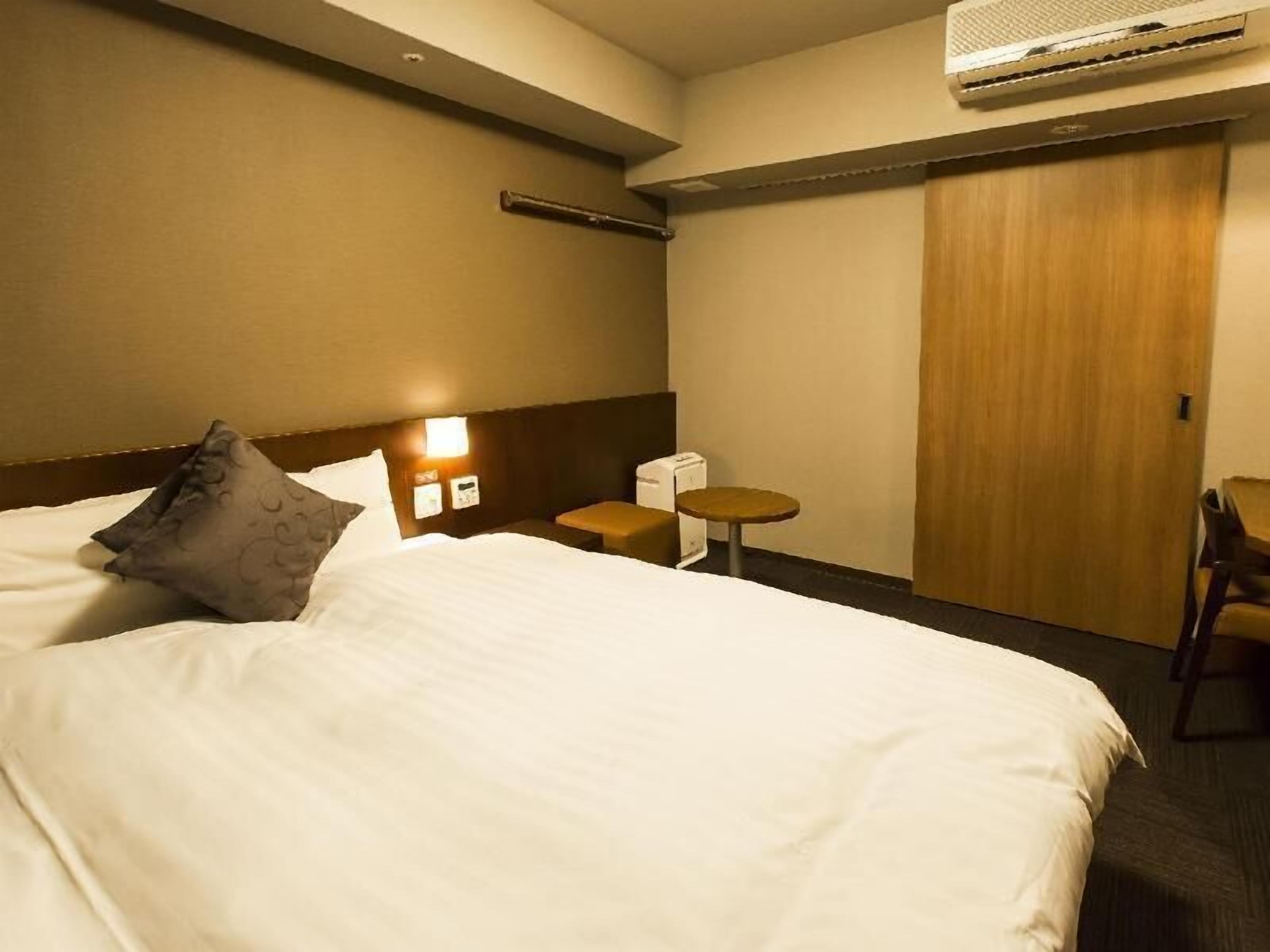 Premium bedding, down duvets, blackout curtains, iron/ironing board