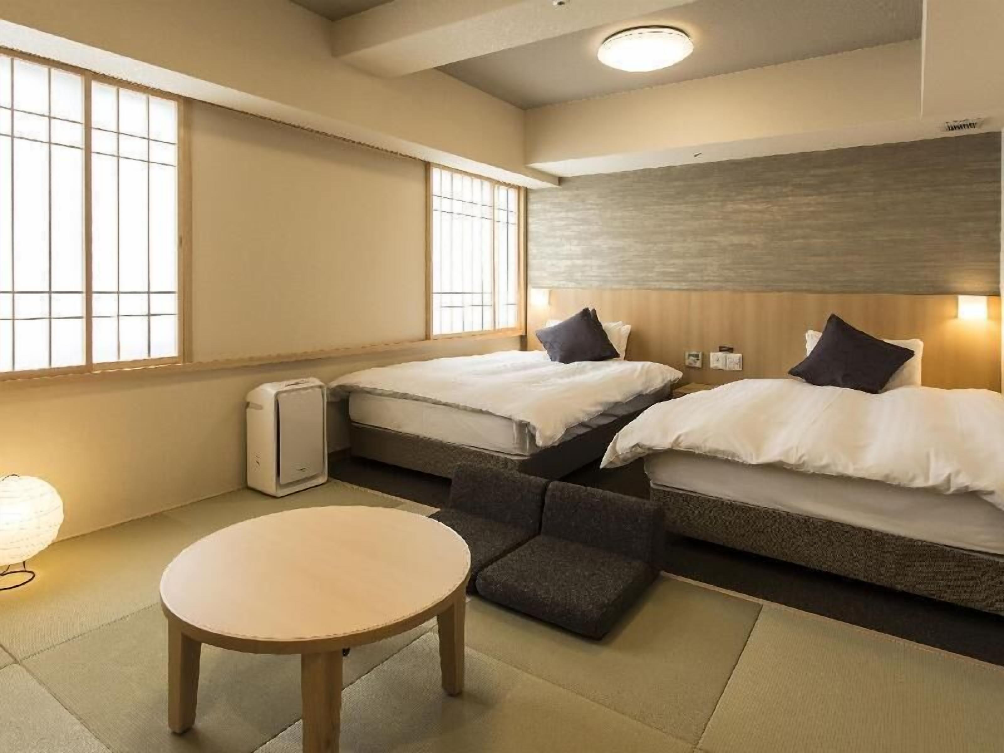 Premium bedding, down duvets, blackout curtains, iron/ironing board