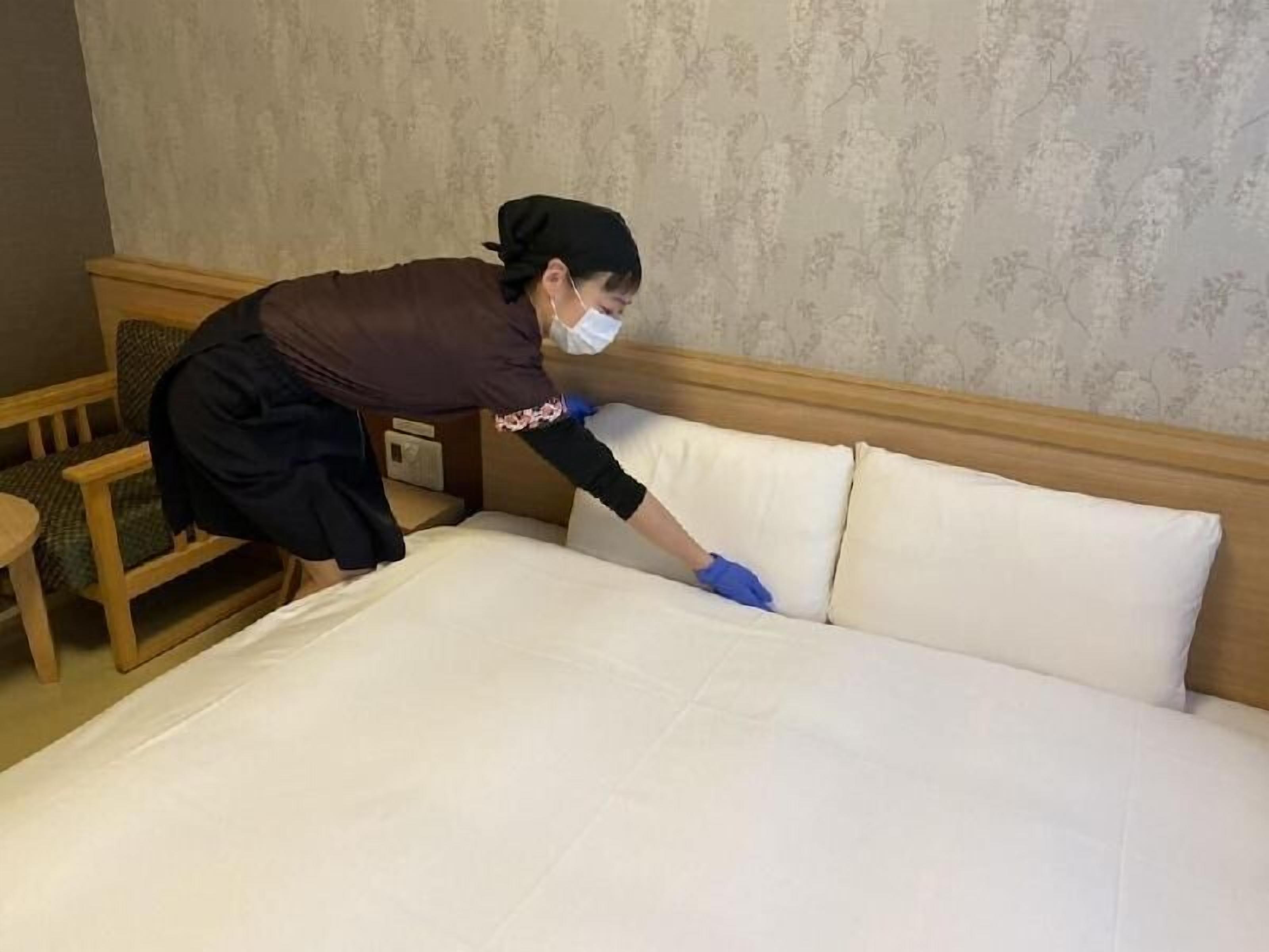 Premium bedding, down duvets, blackout curtains, iron/ironing board