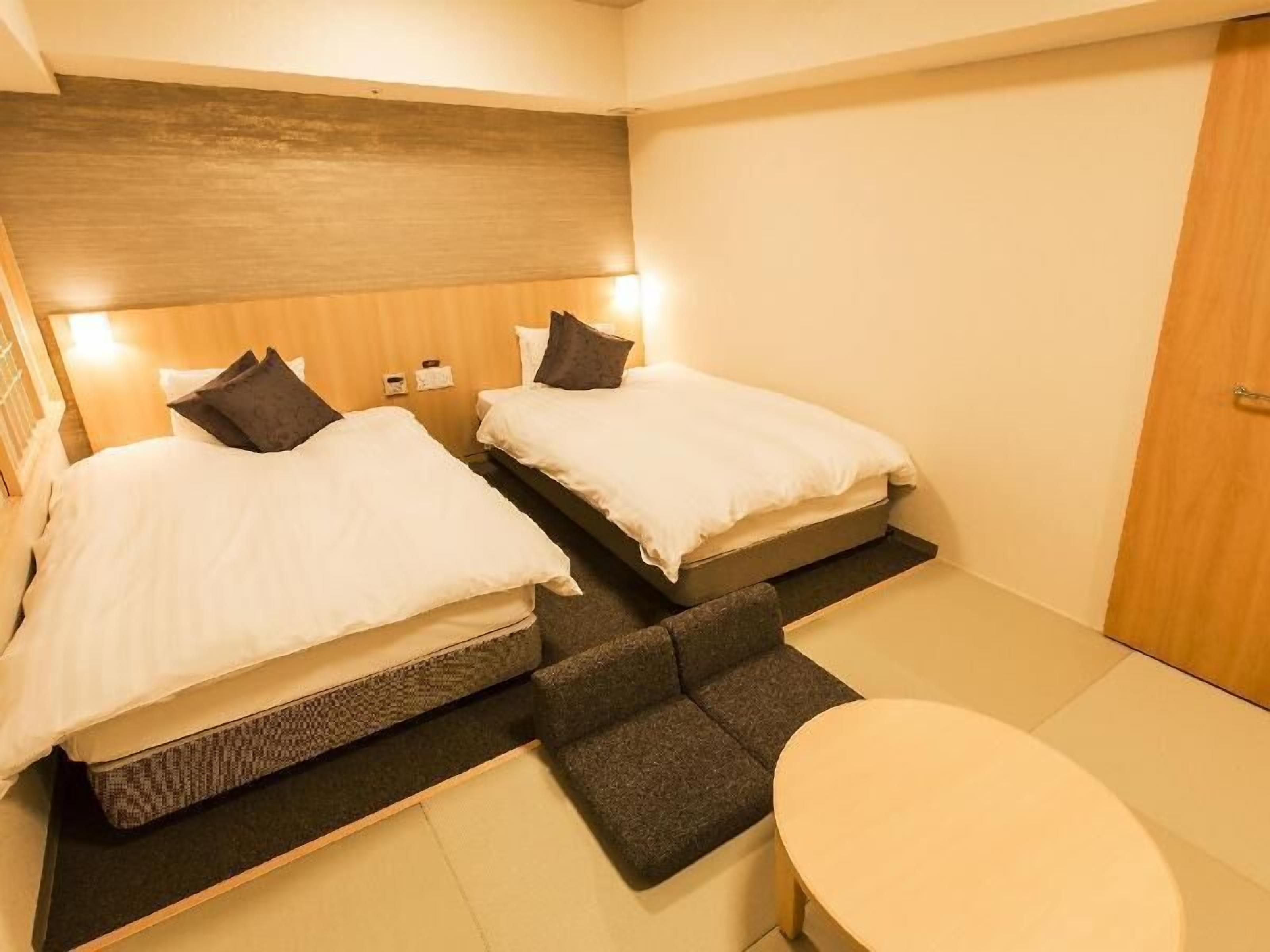 Premium bedding, down duvets, blackout curtains, iron/ironing board