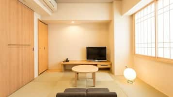 Premium bedding, down comforters, blackout drapes, iron/ironing board