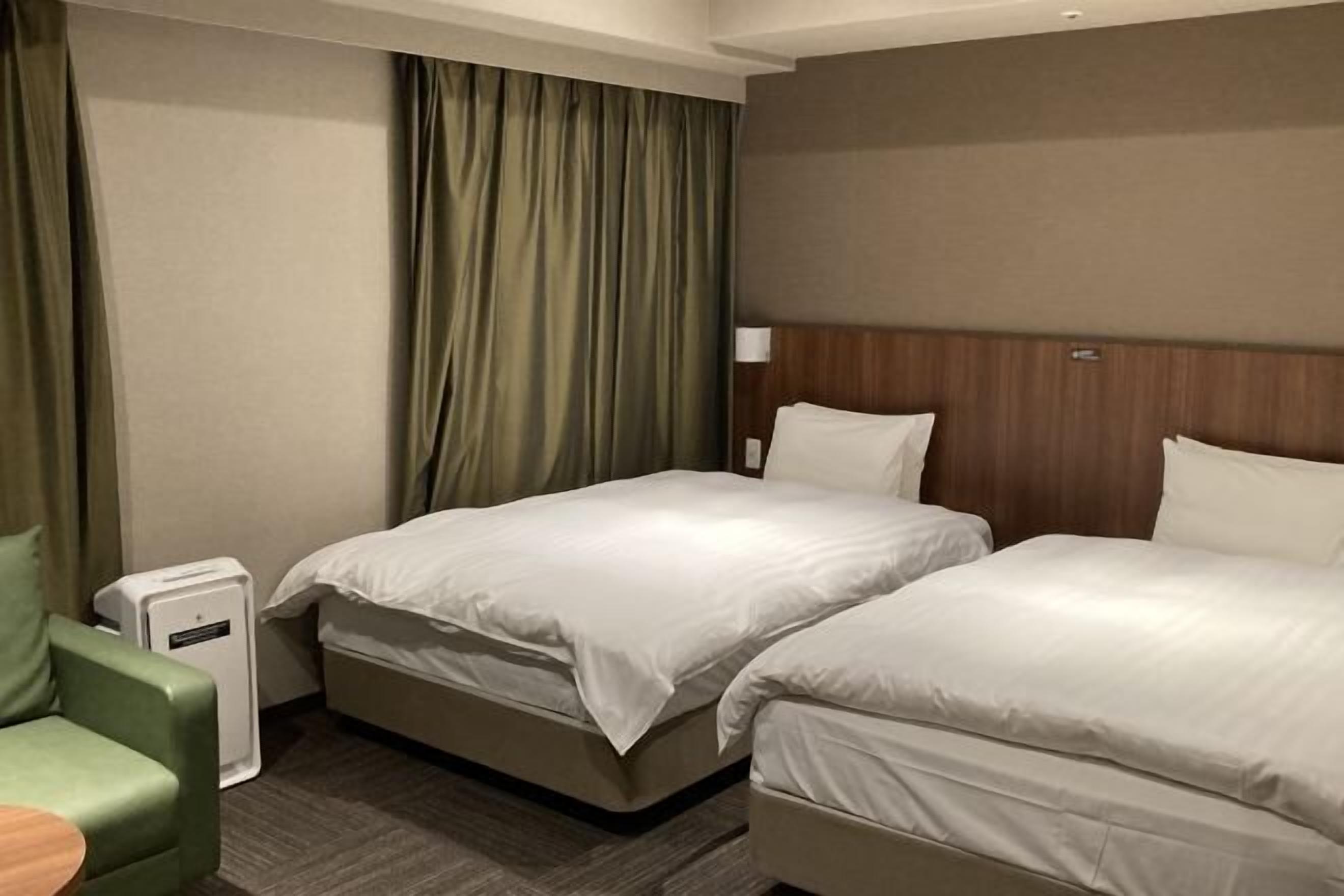 Premium bedding, down duvets, blackout curtains, iron/ironing board