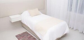 Caja fuerte, mobiliario individual, cortinas opacas