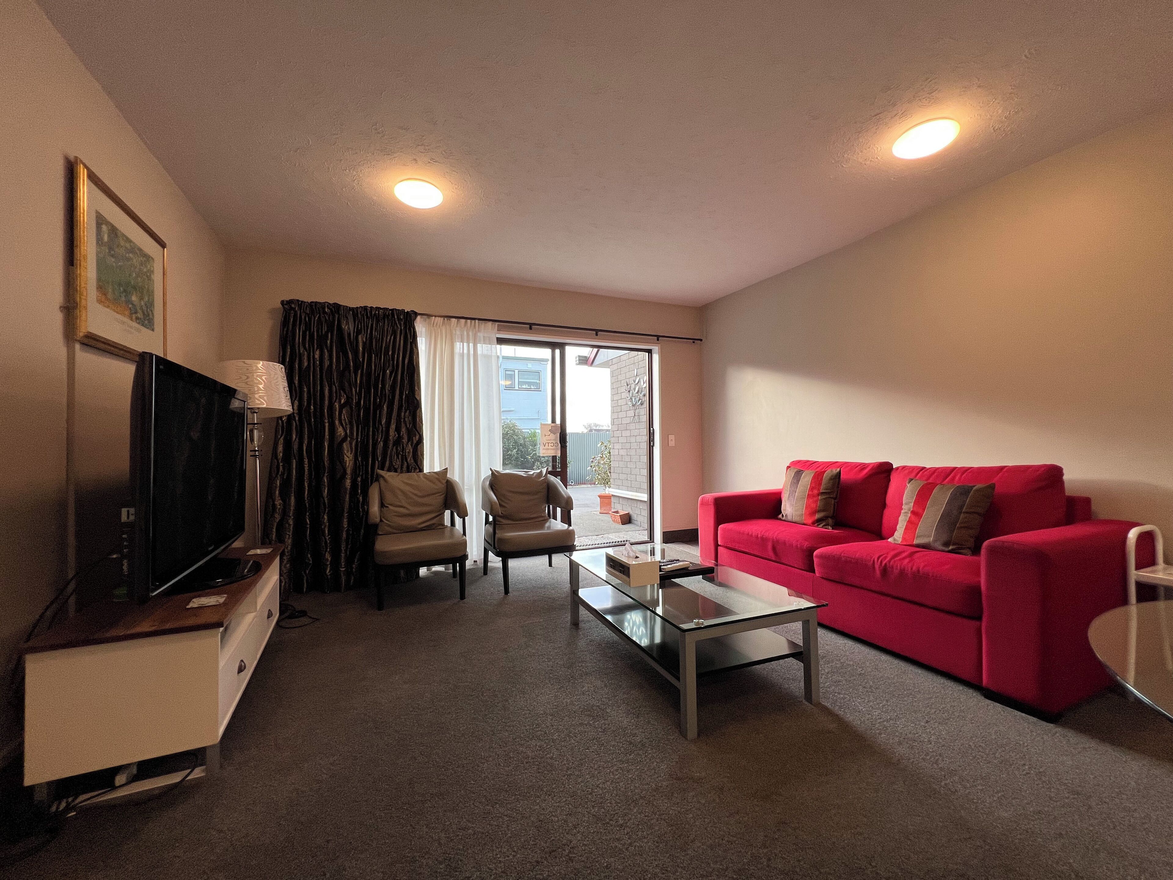 Premium Room, 2 Bedrooms | Living area | LCD TV, DVD player