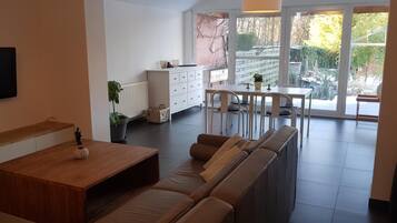 TV a schermo piatto, docking station per iPod