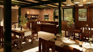 A restaurant with brick walls, wooden tables, and a bar area. - Valle Andino  (Uspallata)