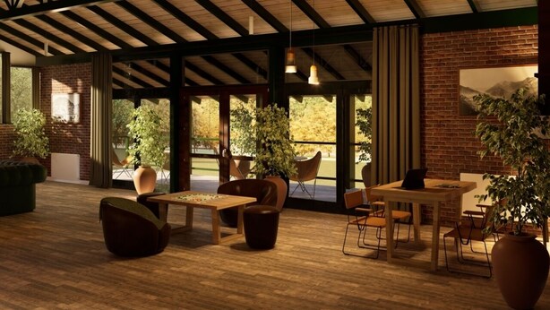 A spacious indoor area with wooden flooring, brick walls, and large windows allowing natural light. There are several tables and chairs arranged for dining or meetings. - Valle Andino  (Uspallata)