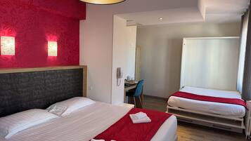 Quadruple Room | Premium bedding, desk, soundproofing, iron/ironing board