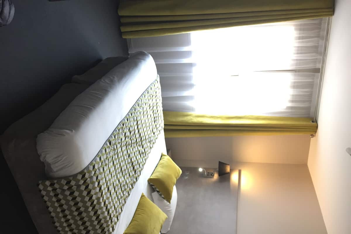 Desk, blackout drapes, cribs (free), WiFi (free)
