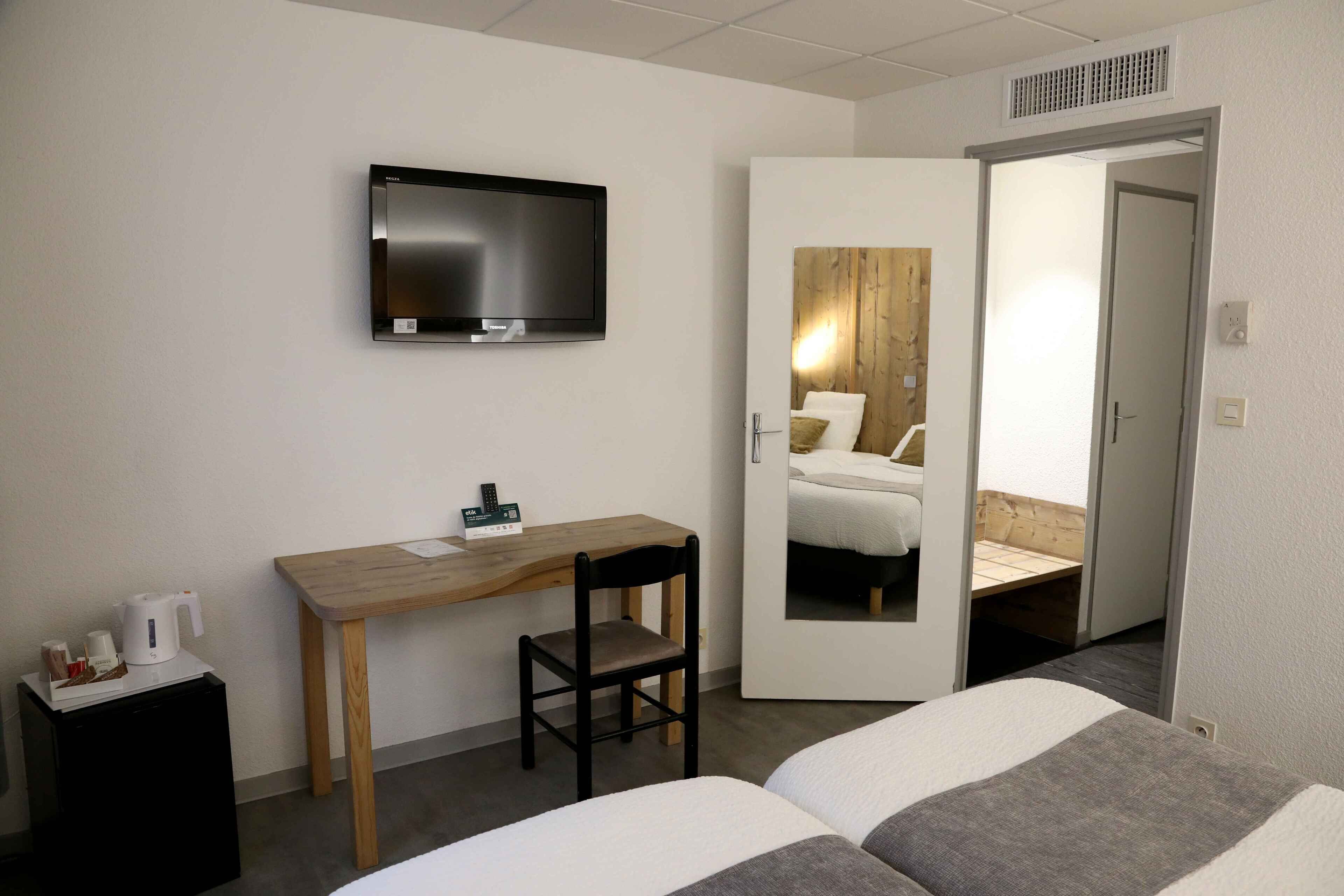 minibar, desk, laptop workspace, blackout curtains