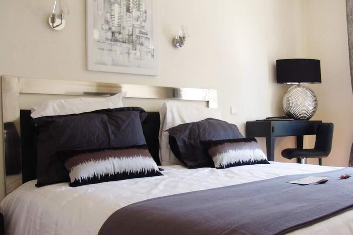 Desk, blackout drapes, WiFi (free), bed sheets