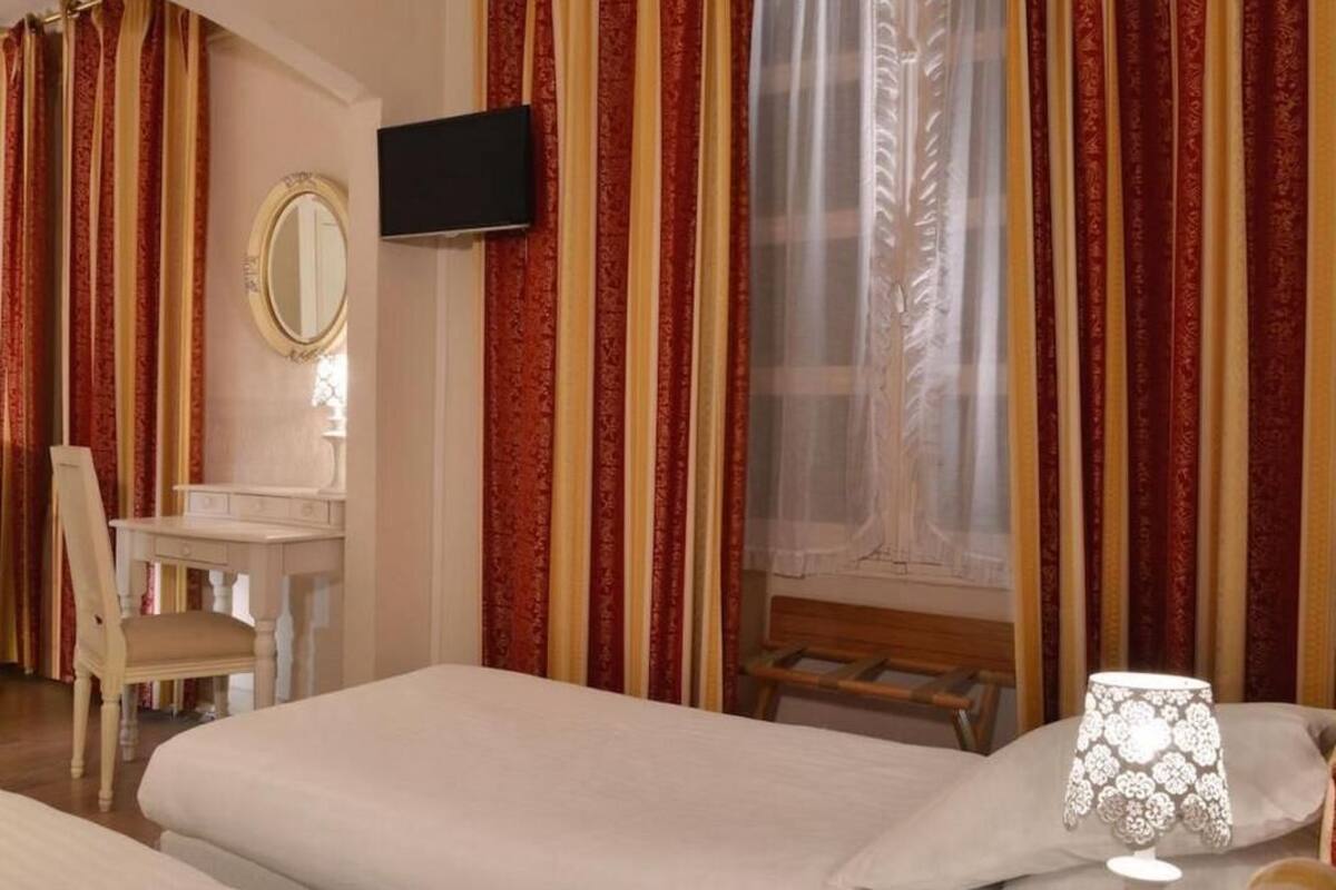 Desk, blackout drapes, WiFi (free), bed sheets