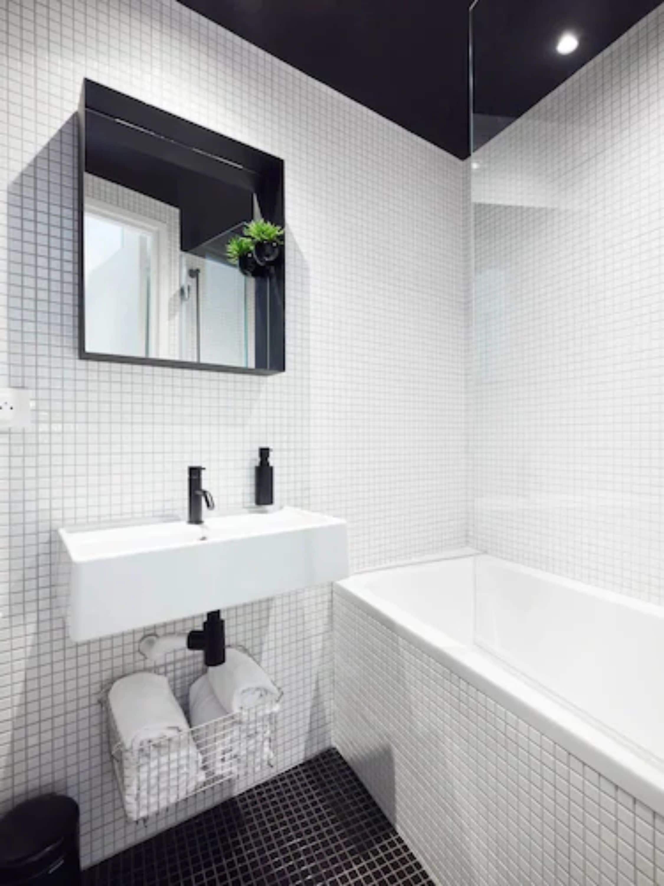 standard twin room | bathroom | hair dryer, towels, soap, shampoo