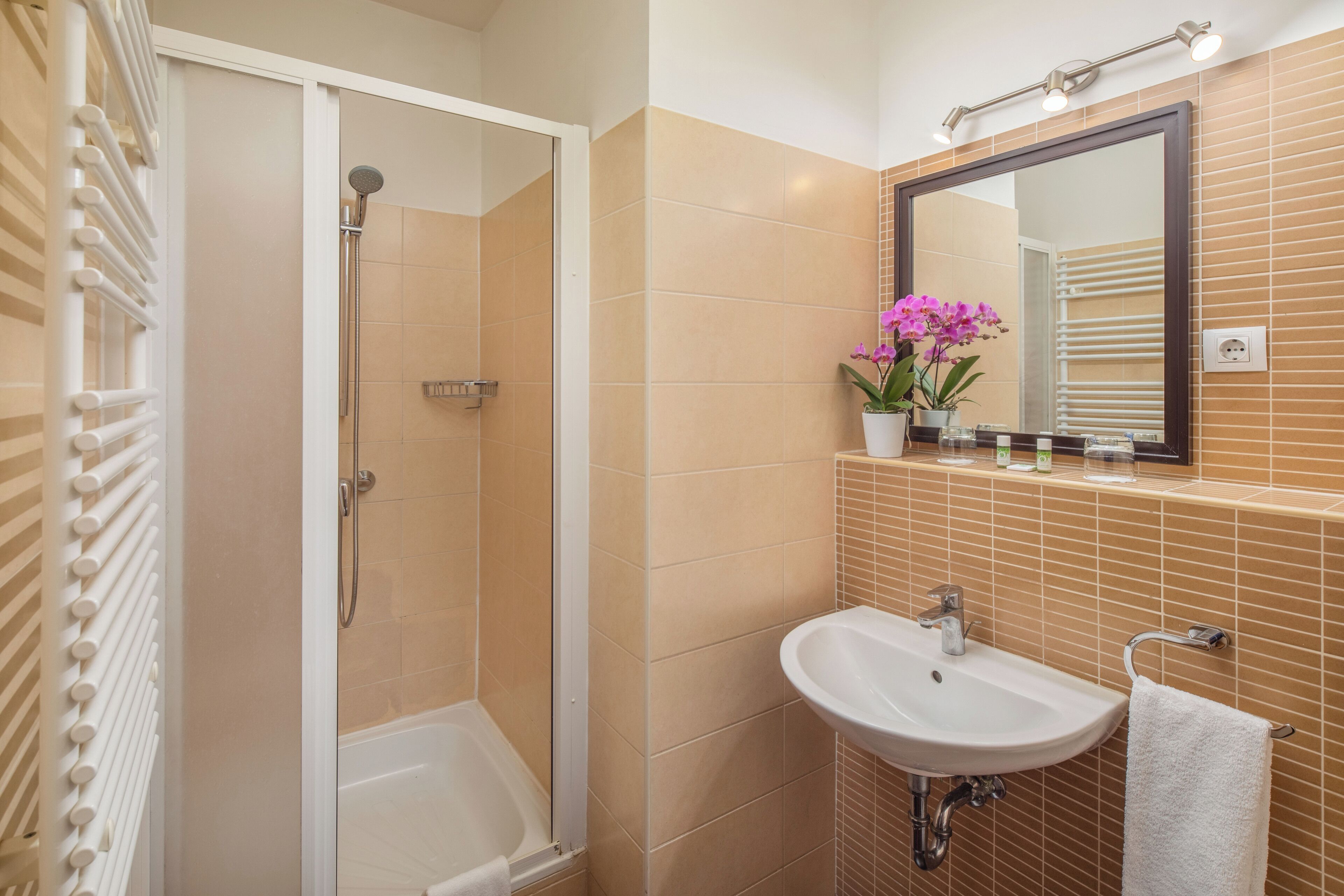 three bedroom penthouse suite  | bathroom | combined shower/bathtub, designer toiletries, hair dryer, towels