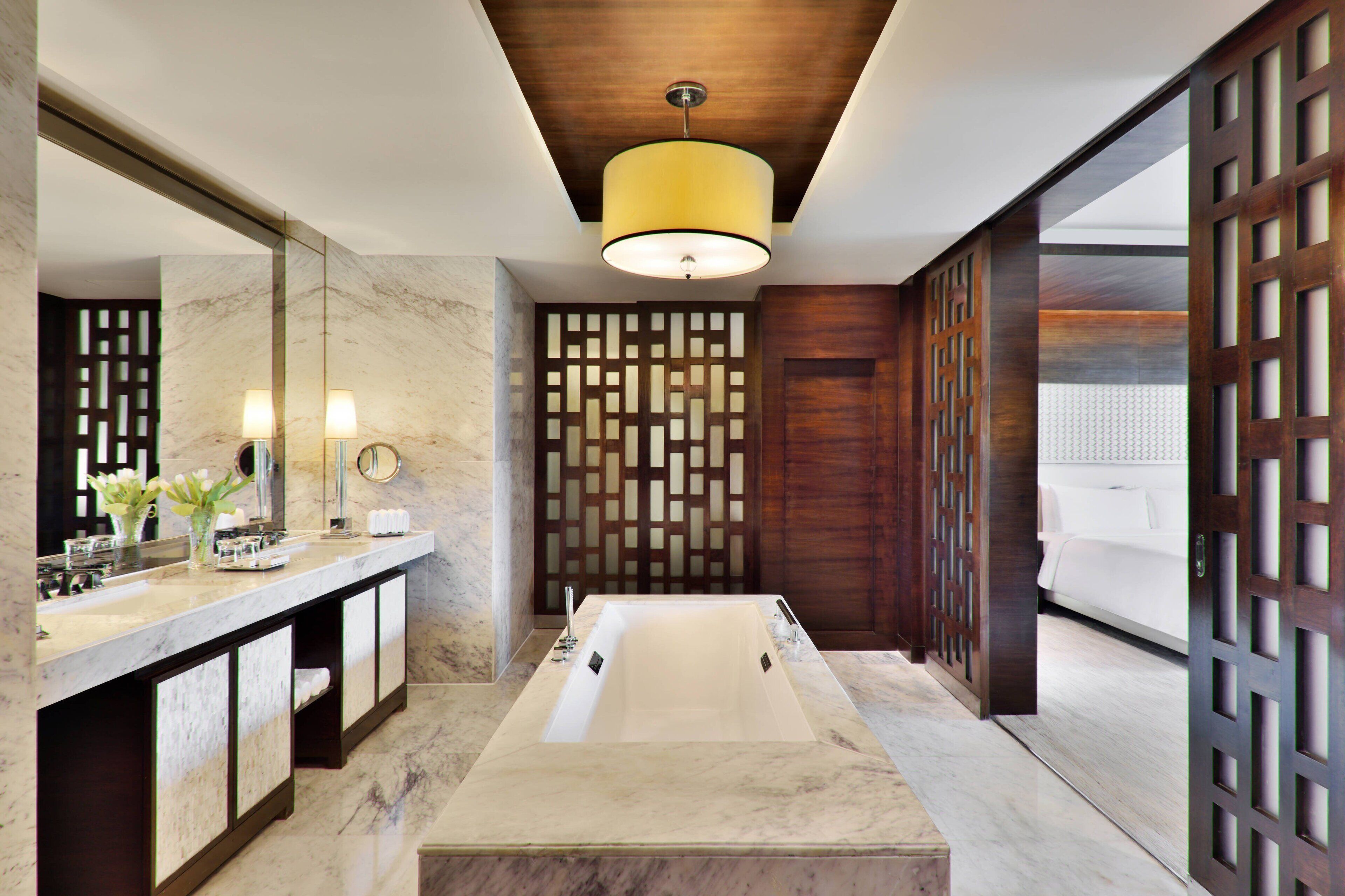 separate bathtub and shower, deep-soaking bathtub, rainfall showerhead