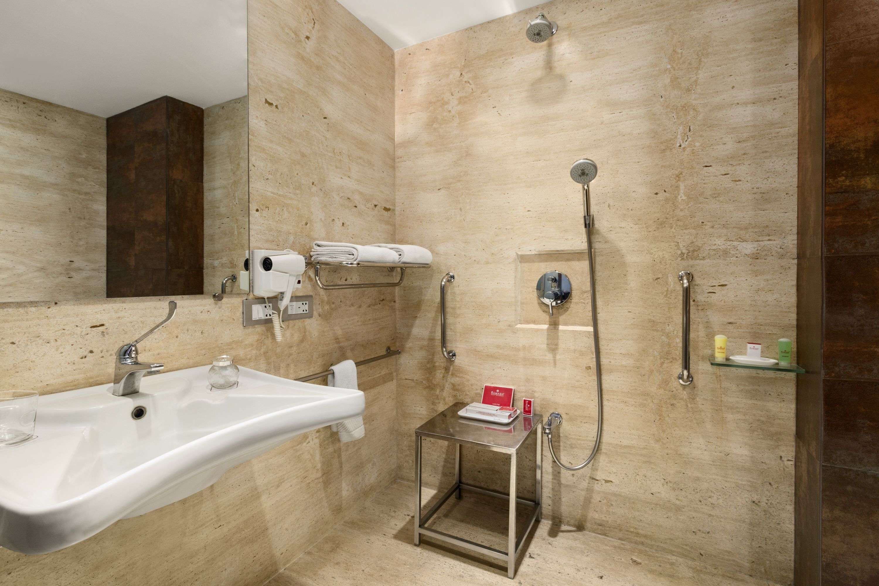 rainfall showerhead, eco-friendly toiletries, hair dryer, bathrobes