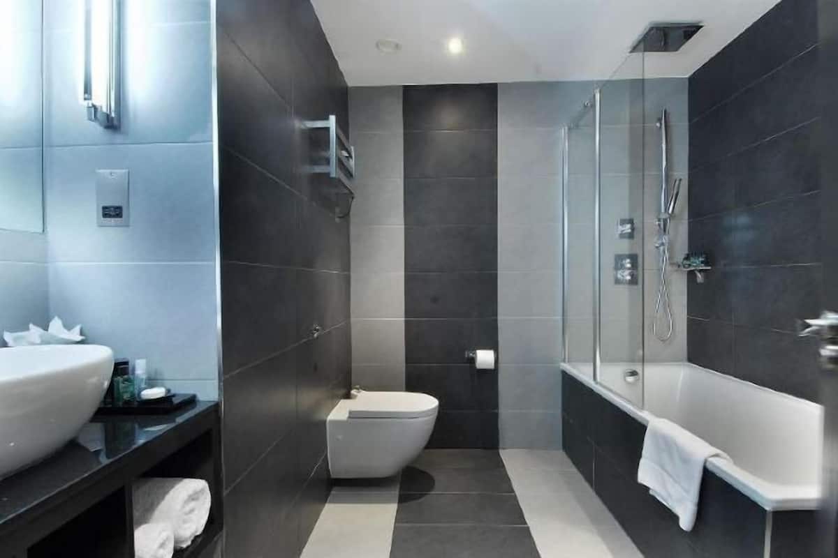 Bathroom | Combined shower/tub, designer toiletries, bathrobes, slippers