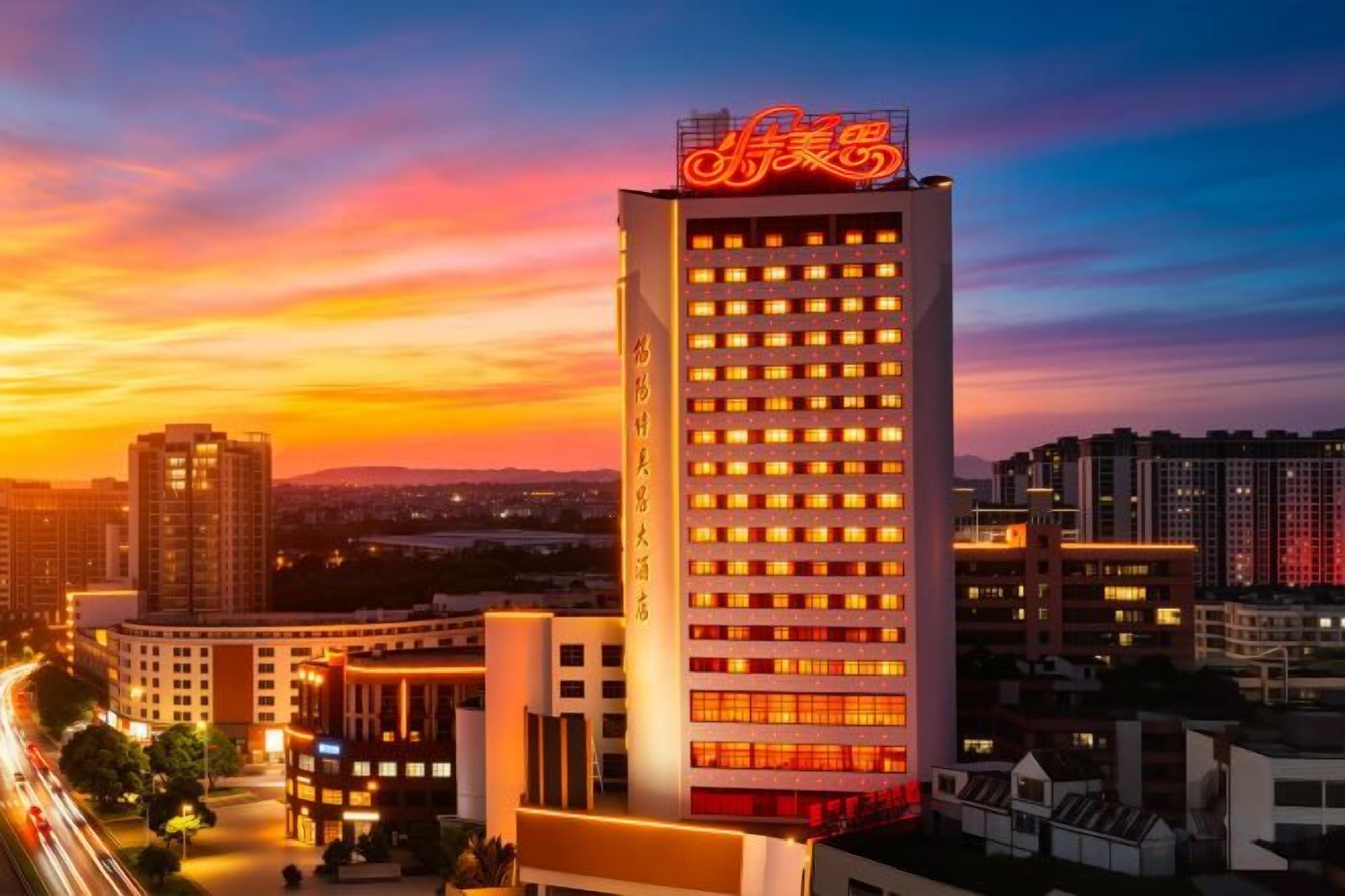 A high-rise hotel with a prominent sign, multiple floors, and a cityscape in the background.