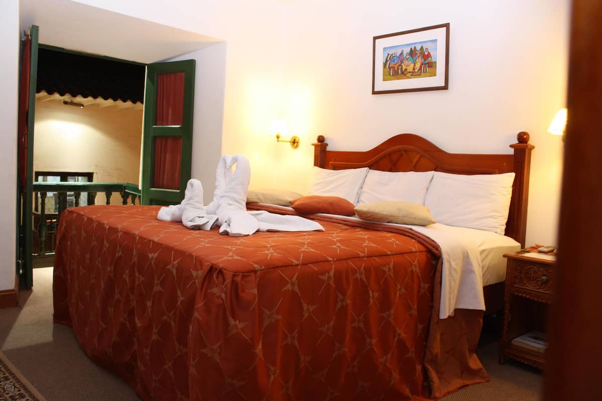 Egyptian cotton sheets, down duvets, Select Comfort beds, in-room safe