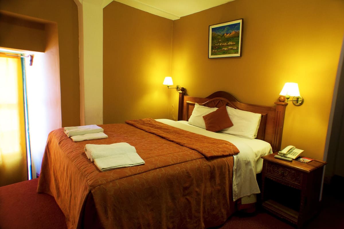 Egyptian cotton sheets, down duvets, Select Comfort beds, in-room safe