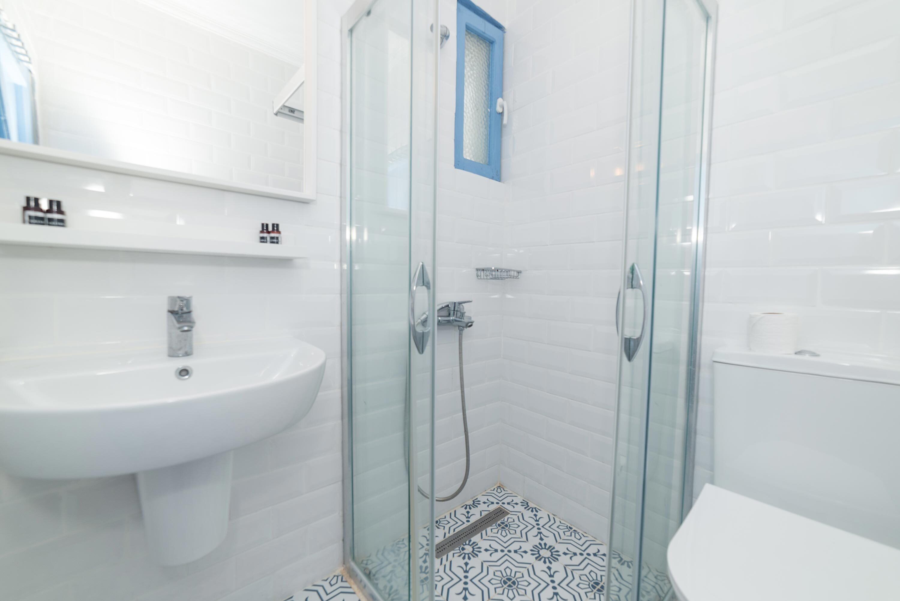 family room | bathroom | shower, free toiletries, hair dryer, slippers