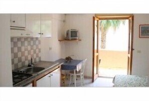 Fridge, stovetop, cookware/dishes/utensils