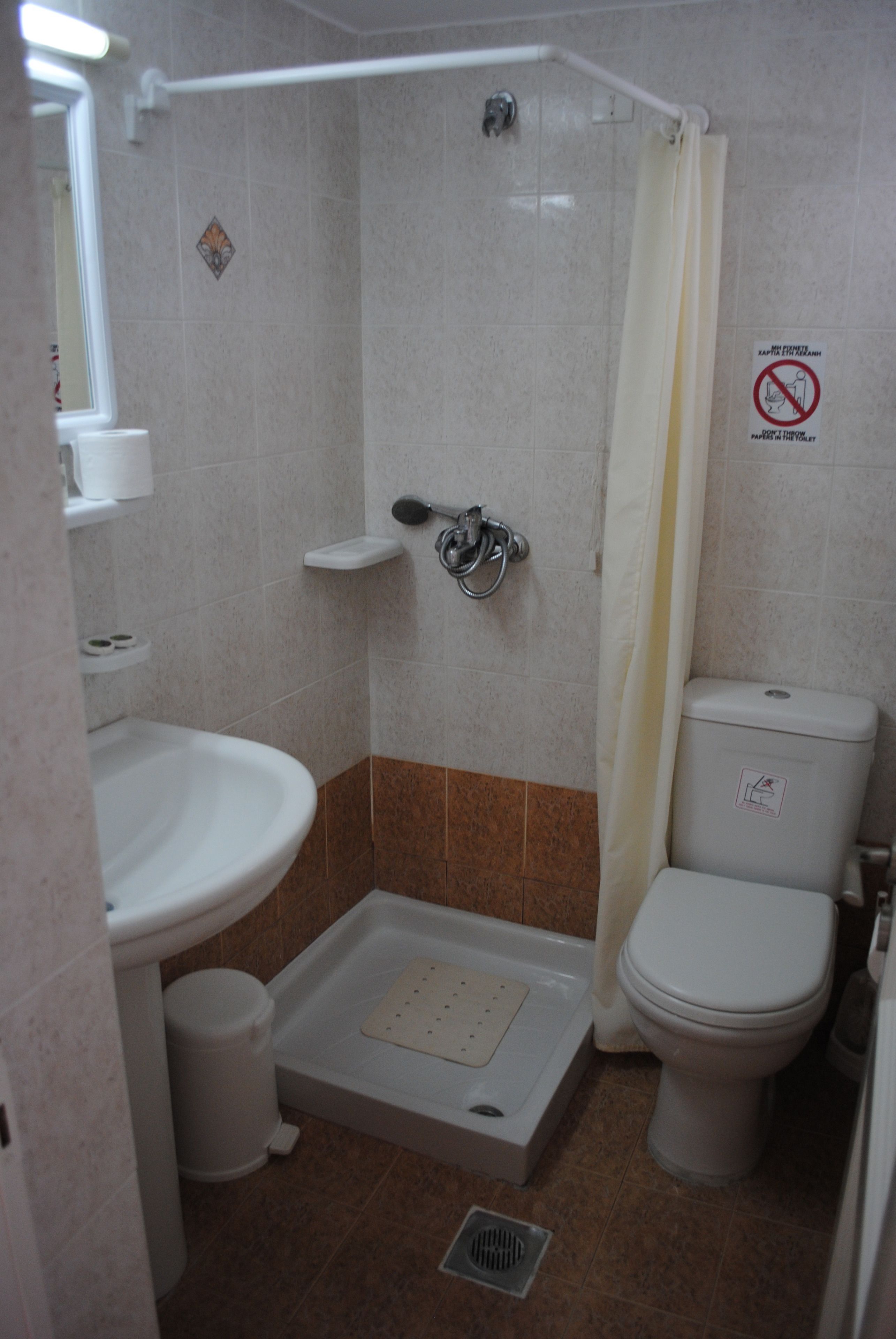 economy room | bathroom | shower, hair dryer, towels, soap