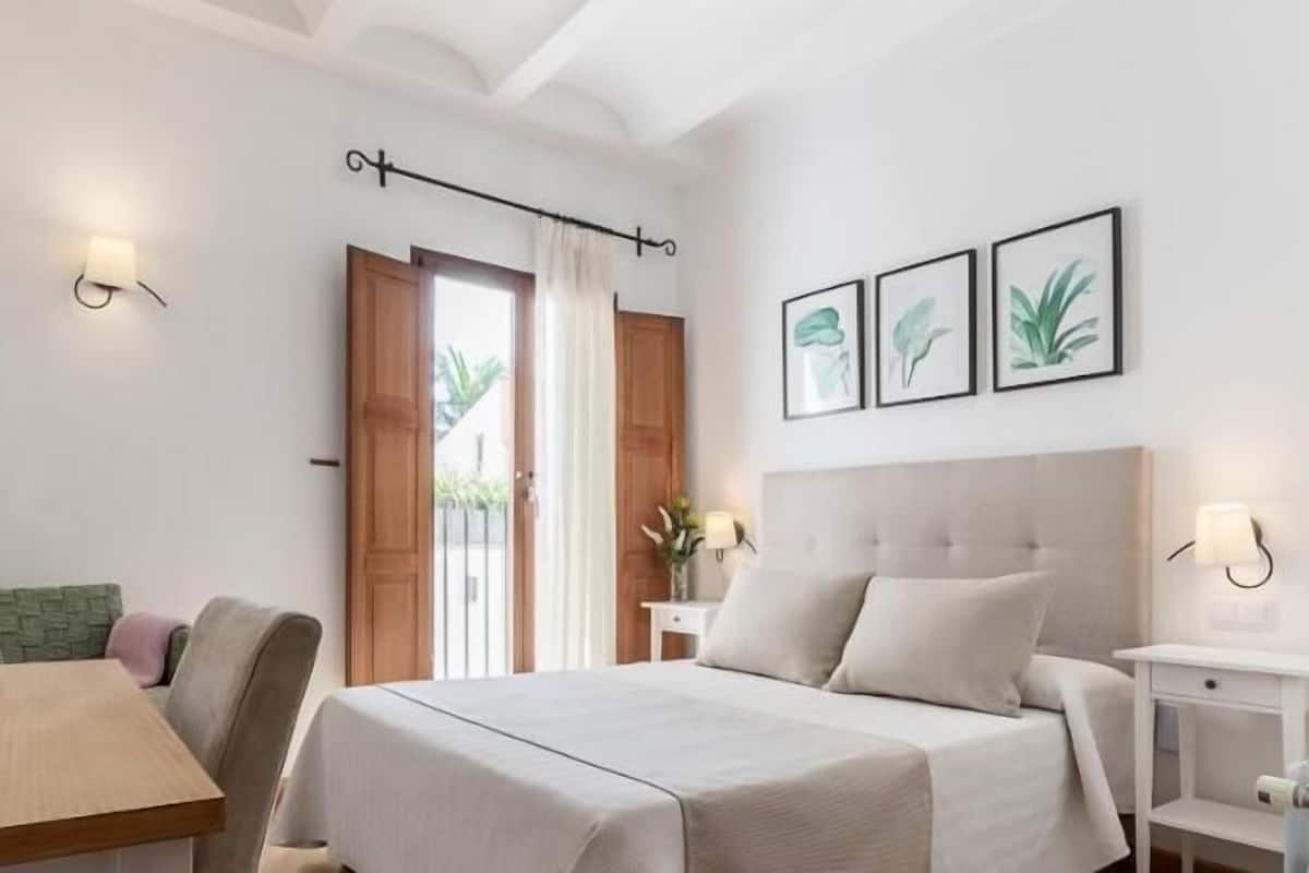 Premium bedding, memory foam beds, desk, laptop workspace