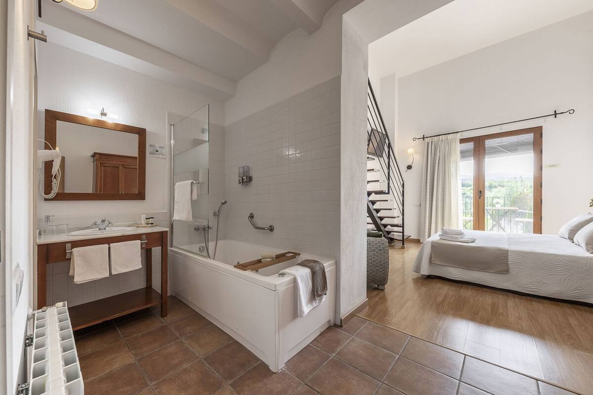 Premium bedding, memory foam beds, desk, laptop workspace