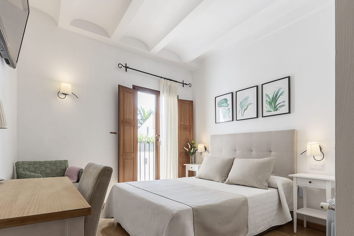 Premium bedding, memory foam beds, desk, laptop workspace