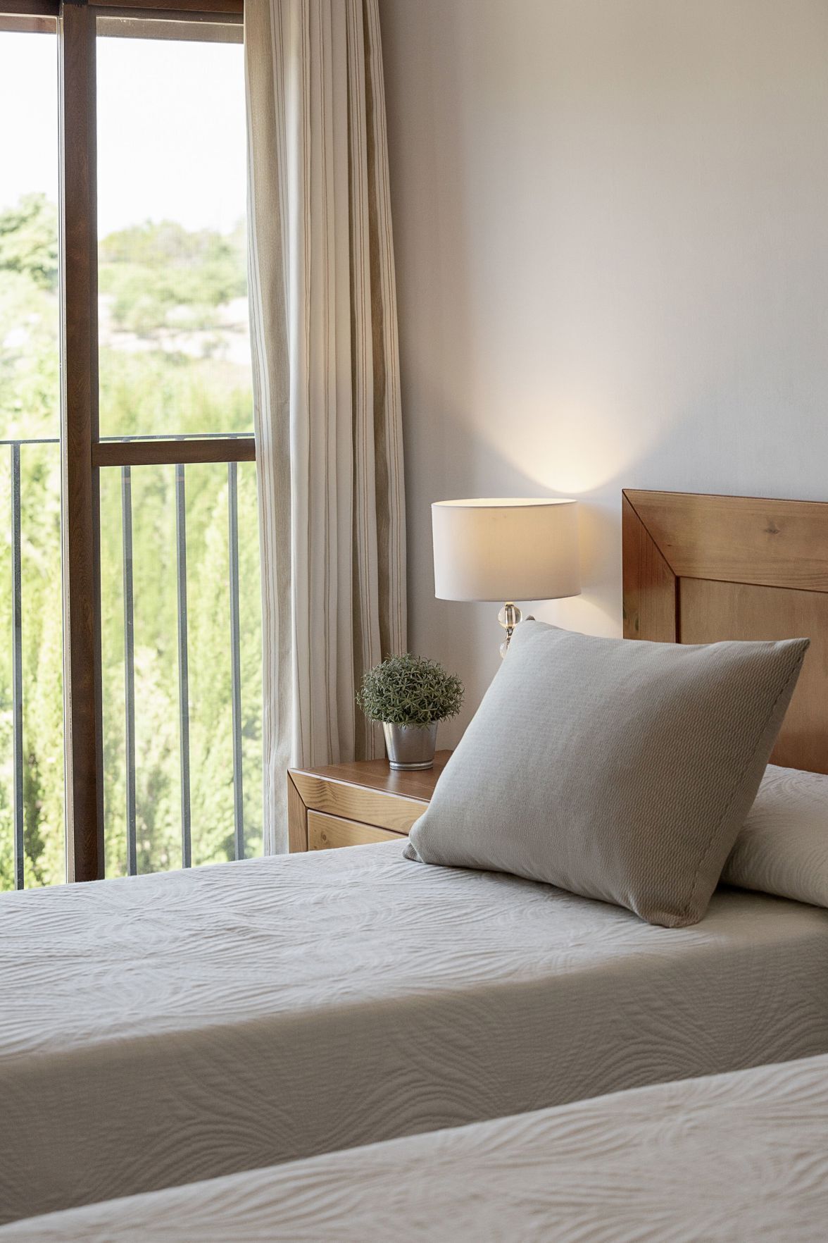 Premium bedding, memory foam beds, desk, laptop workspace