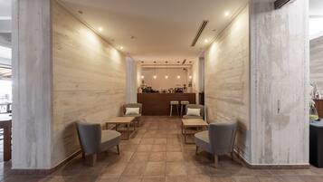 Standard Double Room | Living area | 42-inch plasma TV with digital channels, TV