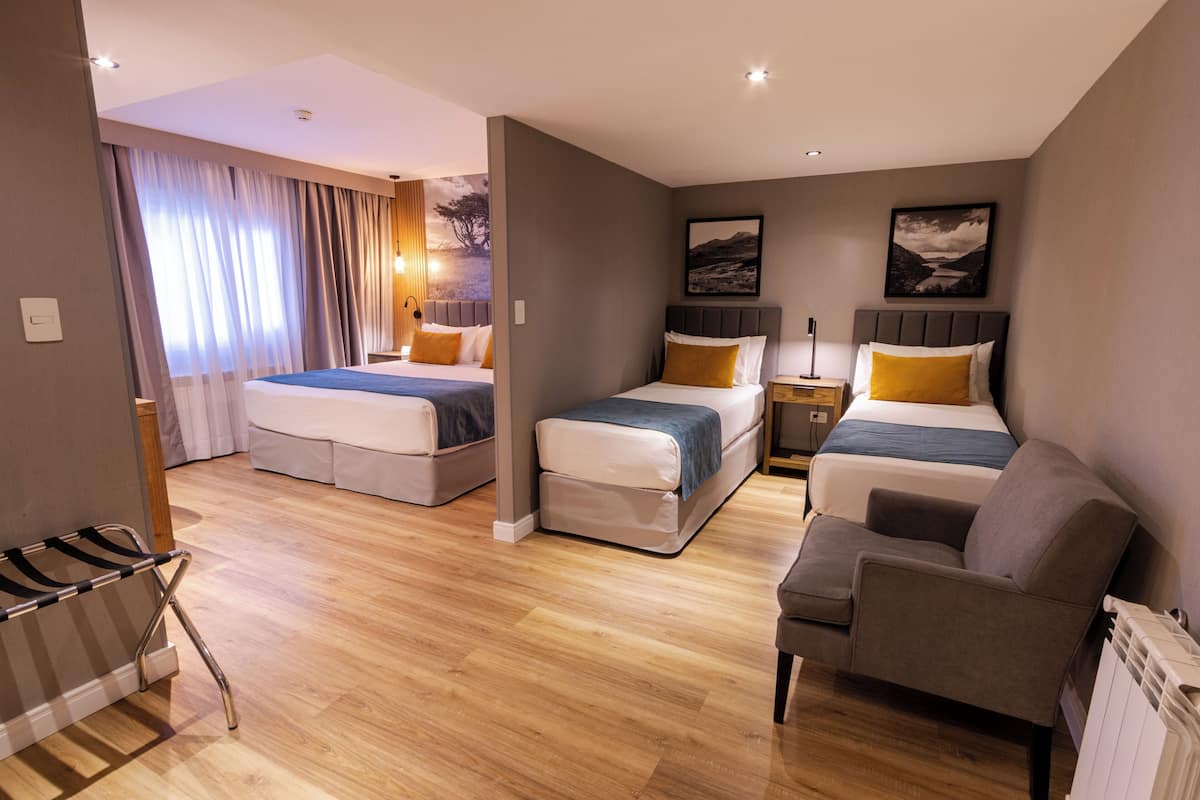 standard quadruple room | select comfort beds, minibar, in-room safe, iron/ironing board