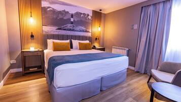 Colchones Select Comfort, minibar y caja de seguridad en la habitación