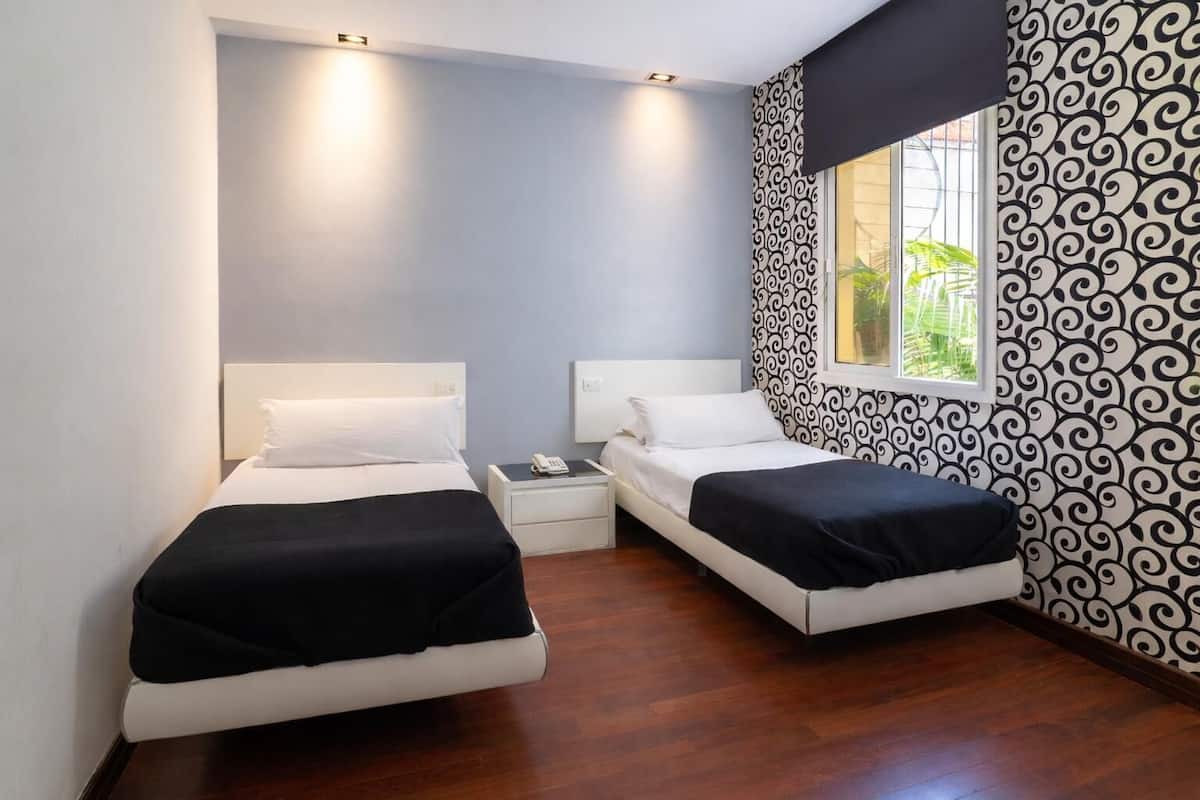 Egyptian cotton sheets, premium bedding, down duvets, memory-foam beds