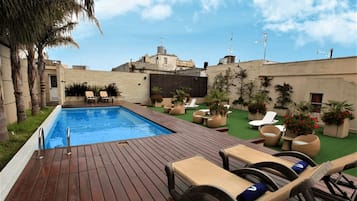 Outdoor pool, open 8 AM to 11 PM, sun loungers