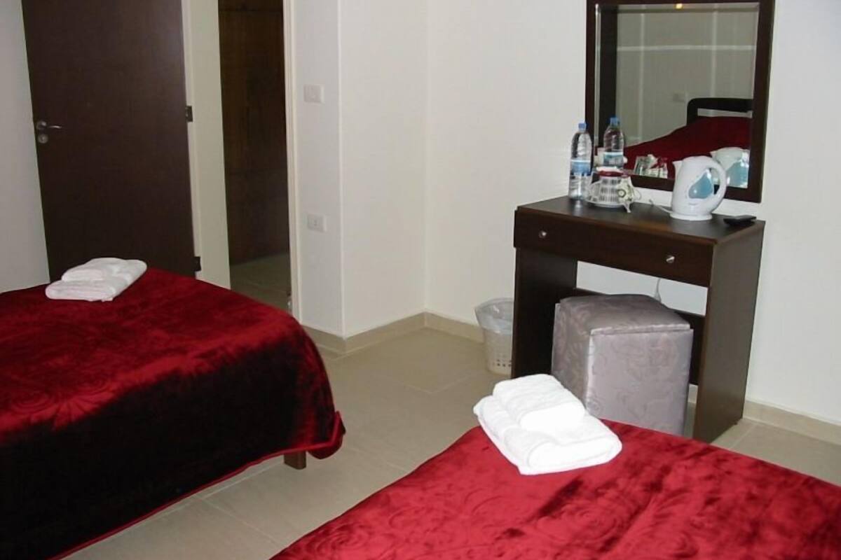 Family Suite | Camas con pillow-top, escritorio, camas extra y wifi gratis